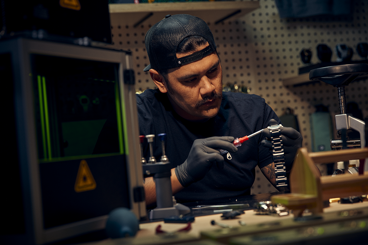 The Nixon Service Center performs a repair on a Nixon watch.