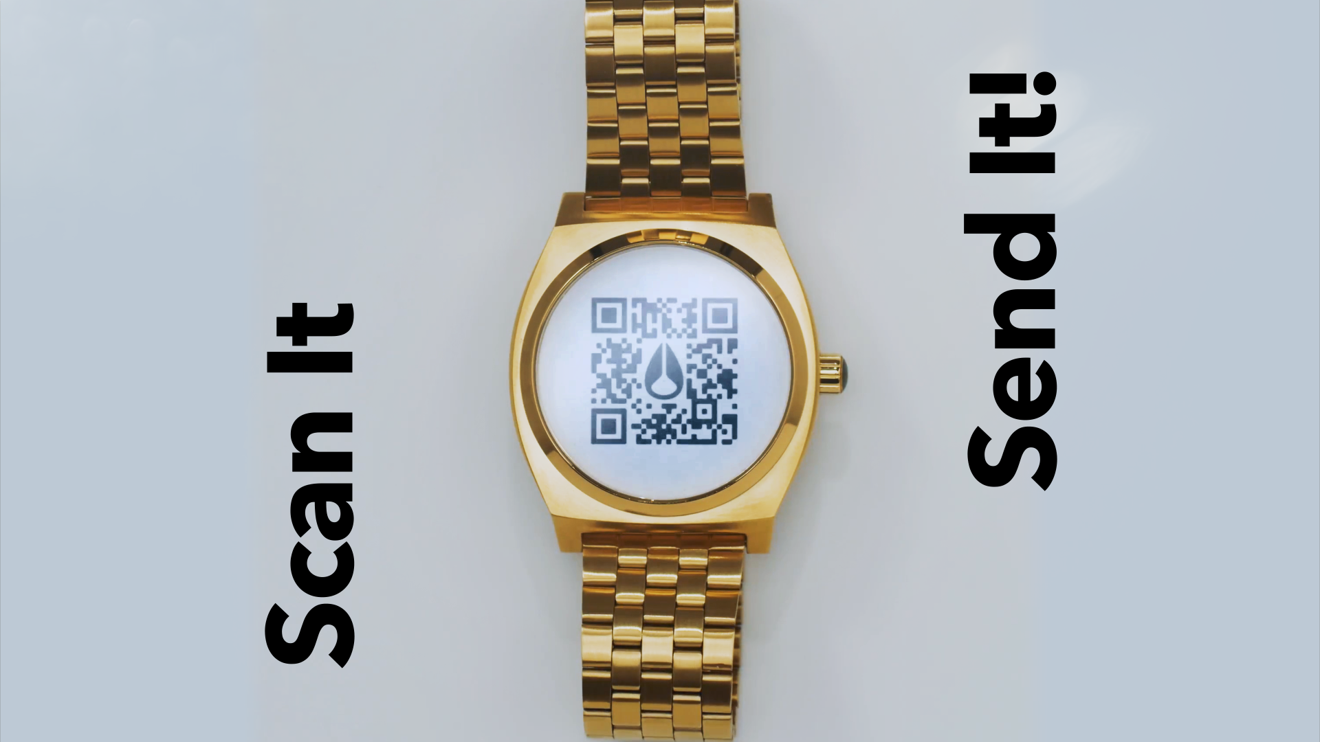 Gold Nixon Time Teller with a QR code