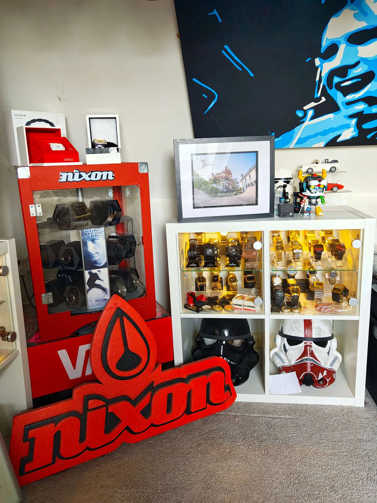A vast collection of Nixon watch and promotional items